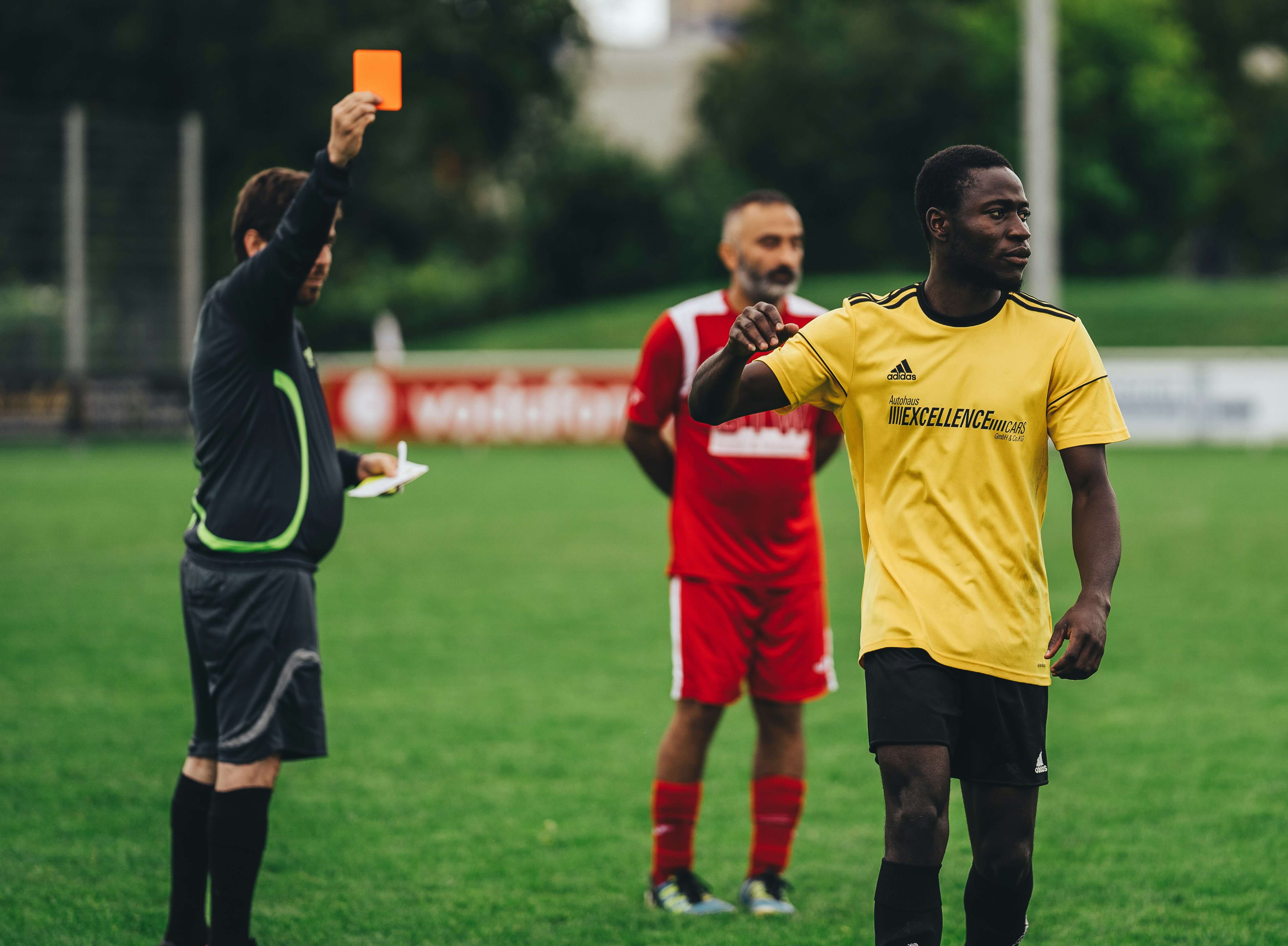 Ilustrasi Red Card dalam Sepak Bola | Sumber: Unsplash.com @Omar Ramadan