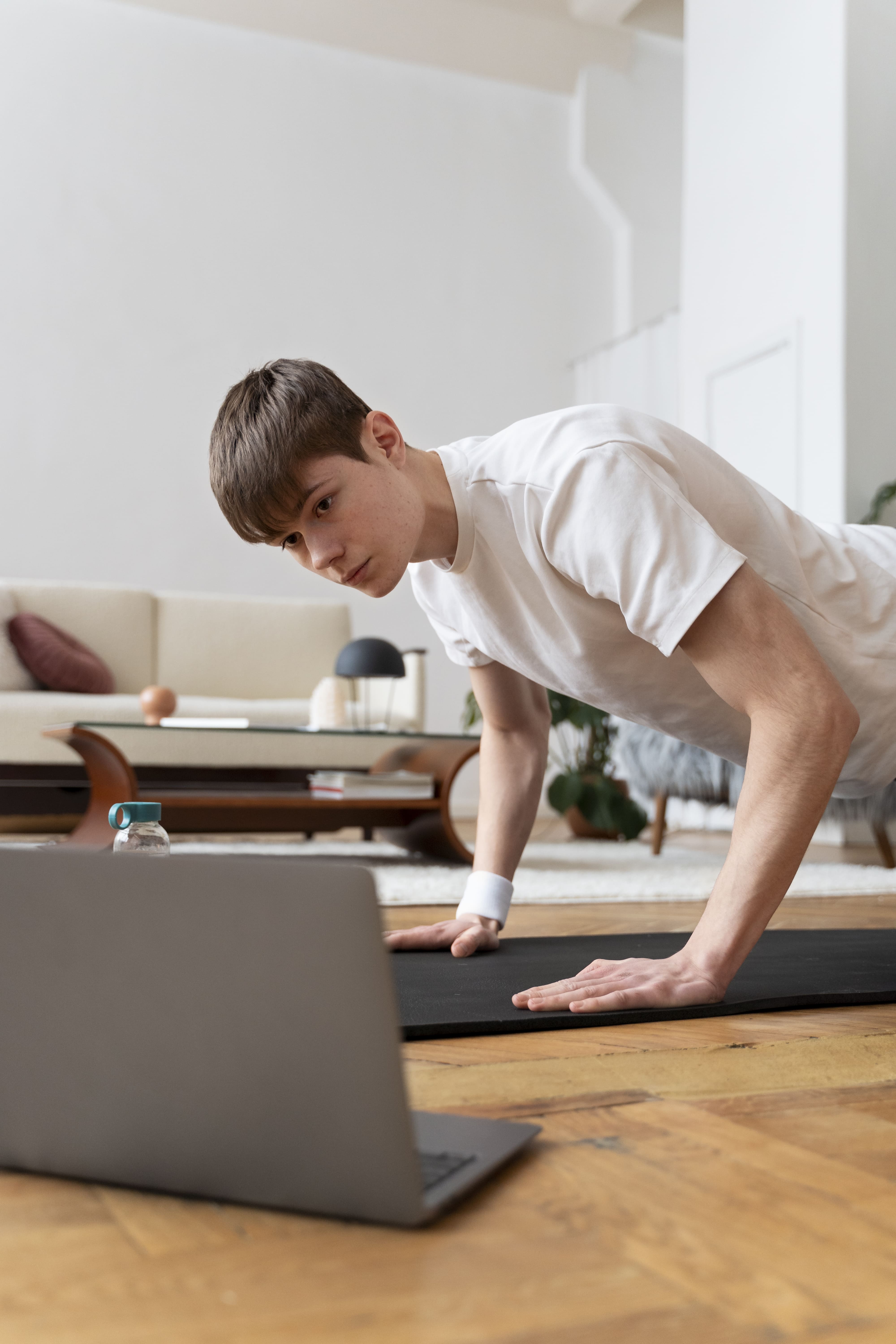 close up man exercising after online instructor 1jpg 20251223212329