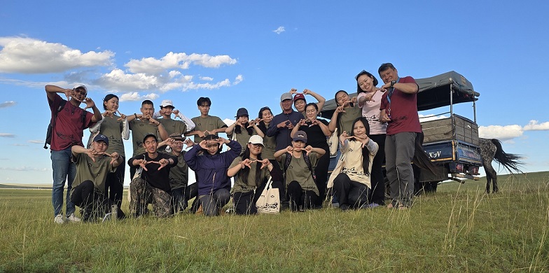 UGM lecturer Dr. Ade (far left) joins young innovators during field research in Mongolia, where environmental challenges inspired prototypes later showcased at UNCCD COP17 (teknikmesin.sv.ugm.ac.id)