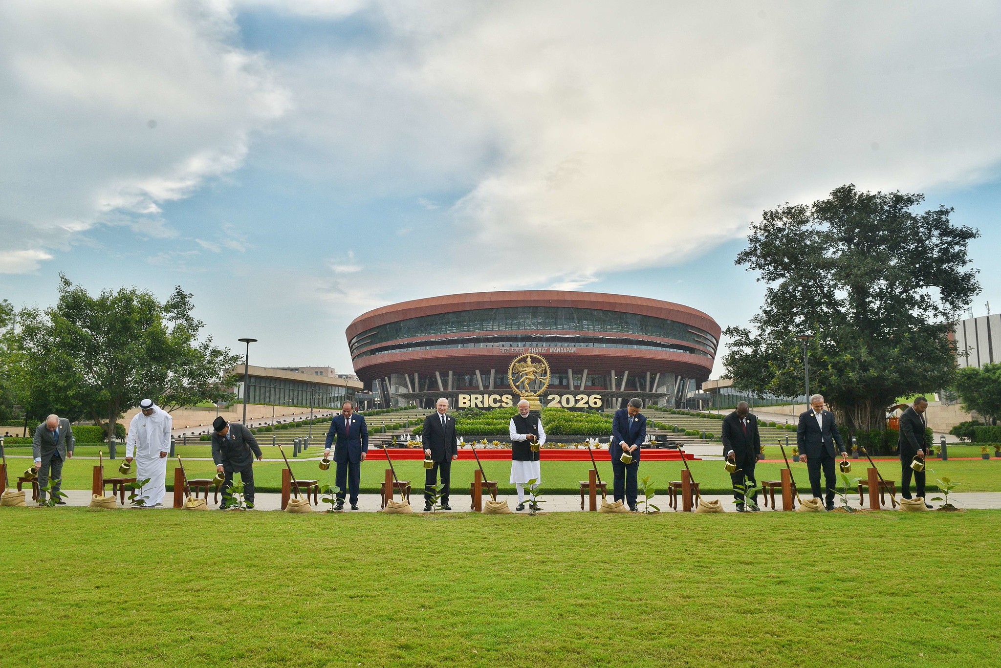 Prime Minister Narendra Modi and fellow BRICS leaders plant banyan saplings at the summit venue in New Delhi, symbolizing shared growth and sustainability.
