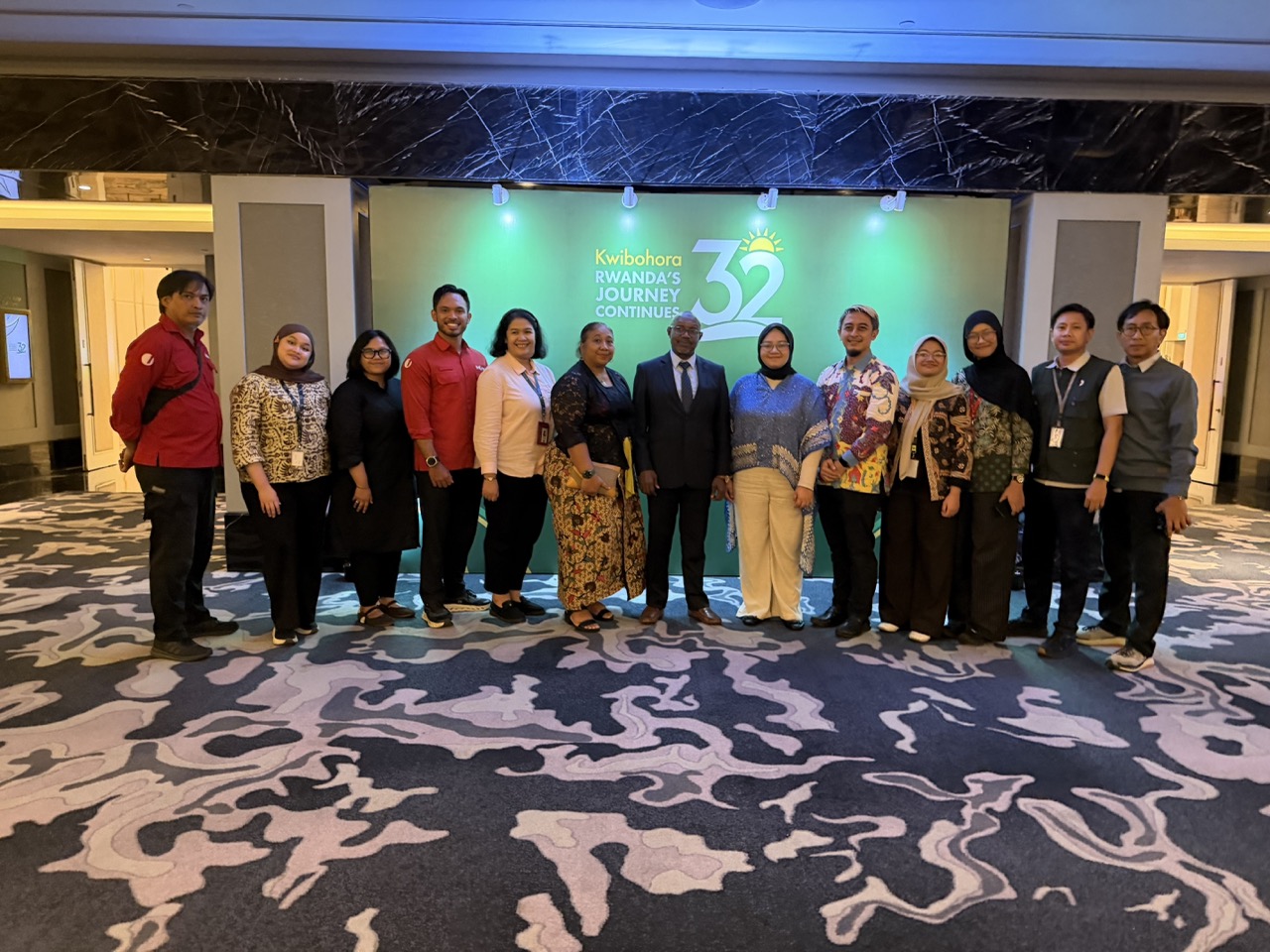 Ambassador of Rwanda to Indonesia H.E. Sheikh Abdul Karim Harelimana poses with members of the media following the Kwibohora 32 reception in Jakarta