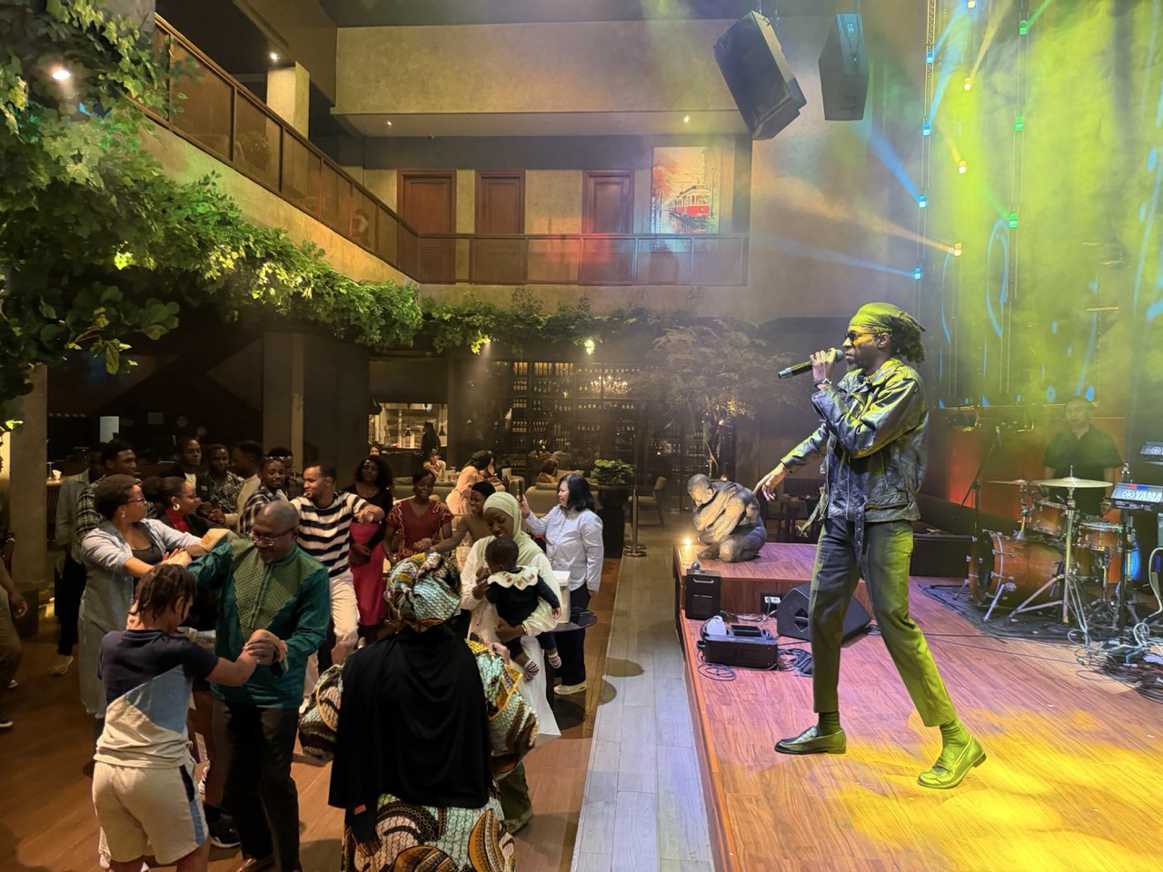 Ambassador Harelimana joins Ruti Joël and guests on the dance floor, celebrating Rwanda–Indonesia friendship through music and dance