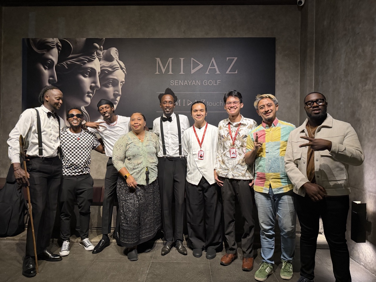 Ruti Joël poses with journalists and guests following his cultural performance in Jakarta
