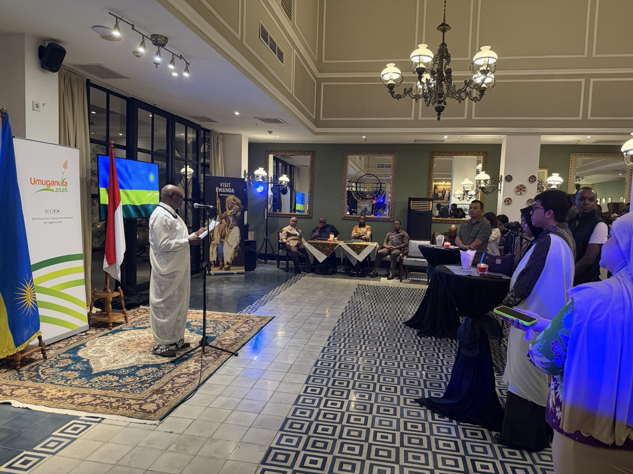 H.E. Sheikh Abdul Karim Harelimana, Ambassador of Rwanda to Indonesia, delivers his opening remarks at the Umuganura 2026 celebration in Jakarta.