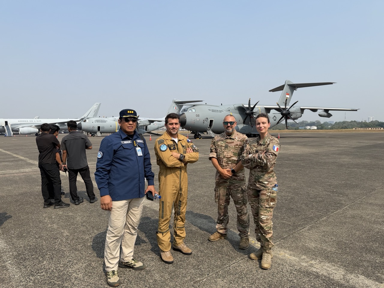 Indonesian and French personnel pose in front of an Indonesian Air Force A400M during PEGASE 2026 at Halim Perdanakusuma Air Base.