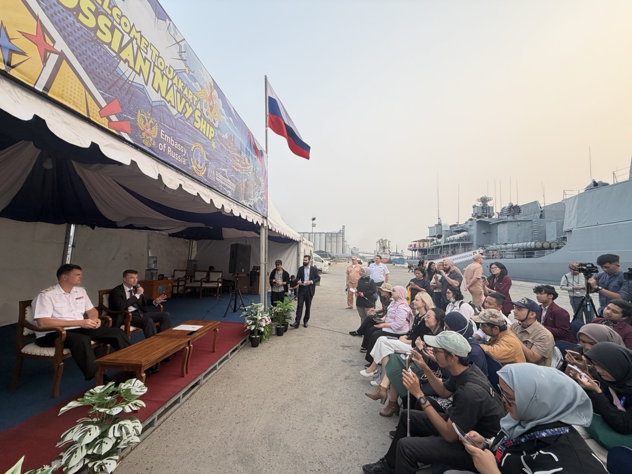 Journalists attend a dockside briefing during Russian Open Ship Day at Tanjung Priok, Jakarta, on October 2, 2026.