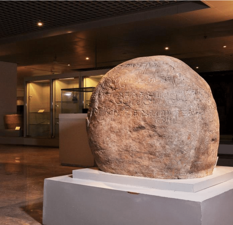 The fifth-century Tugu Inscription, recording King Purnawarman’s Gomati waterway project, is displayed at the National Museum of Indonesia. Source: Directorate General of Culture, Ministry of Education and Culture.