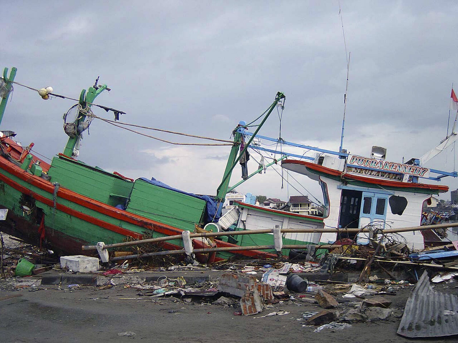Fishing boat tossed ashore in Aceh, Indonesia After Tsunami| Credit: Wikimedia Commons