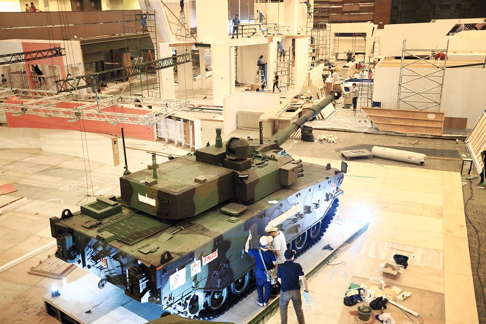 Tiger in your tank: Workers of state-owned weapons manufacturer PT Pindad prepare a medium-size Tiger tank to be displayed at the Indo Defense 2018 Expo & Forum held in November 2018. Image: The Jakarta Post/Dhoni Setiawan