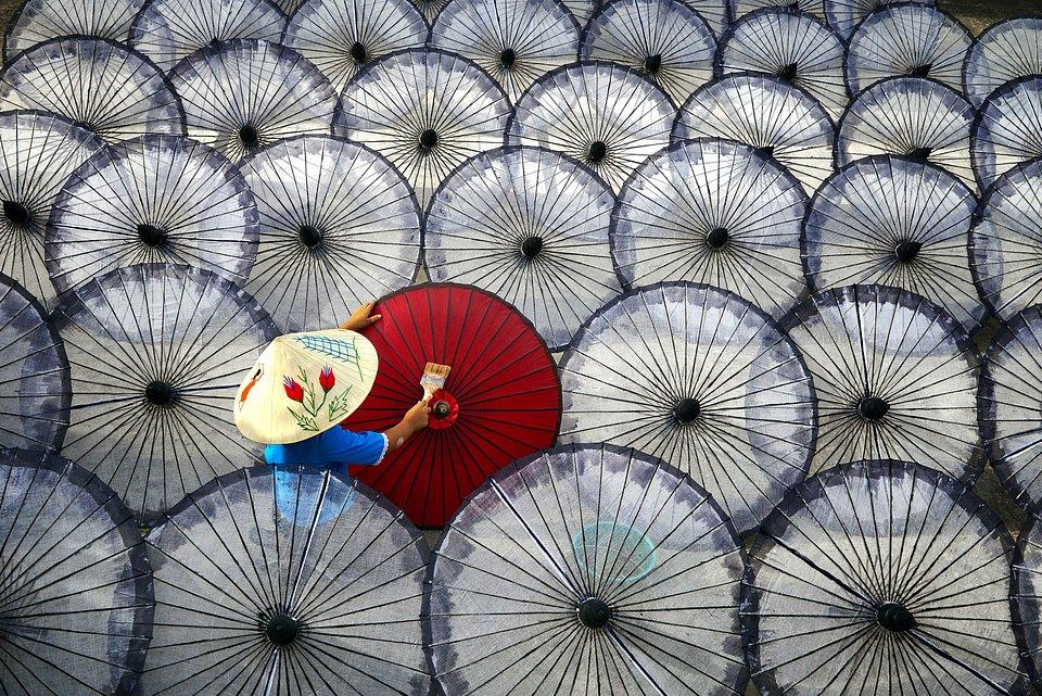 'Girl', a young woman painting umbrellas in Mandalay, Myanmar. Finalist. PHOTO: @CHANTHAR, MYANMAR - AGORA